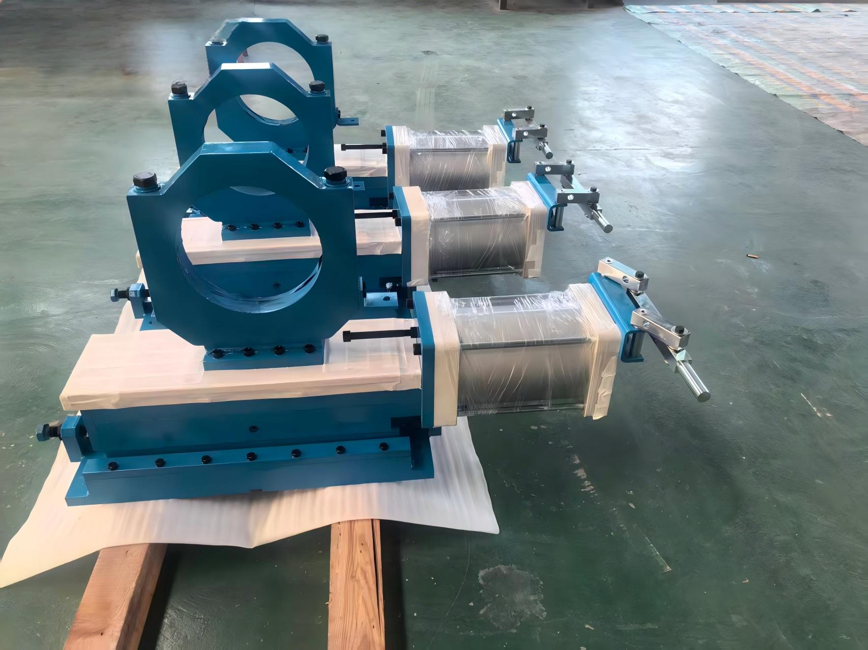 Finished paper machine tensioners
